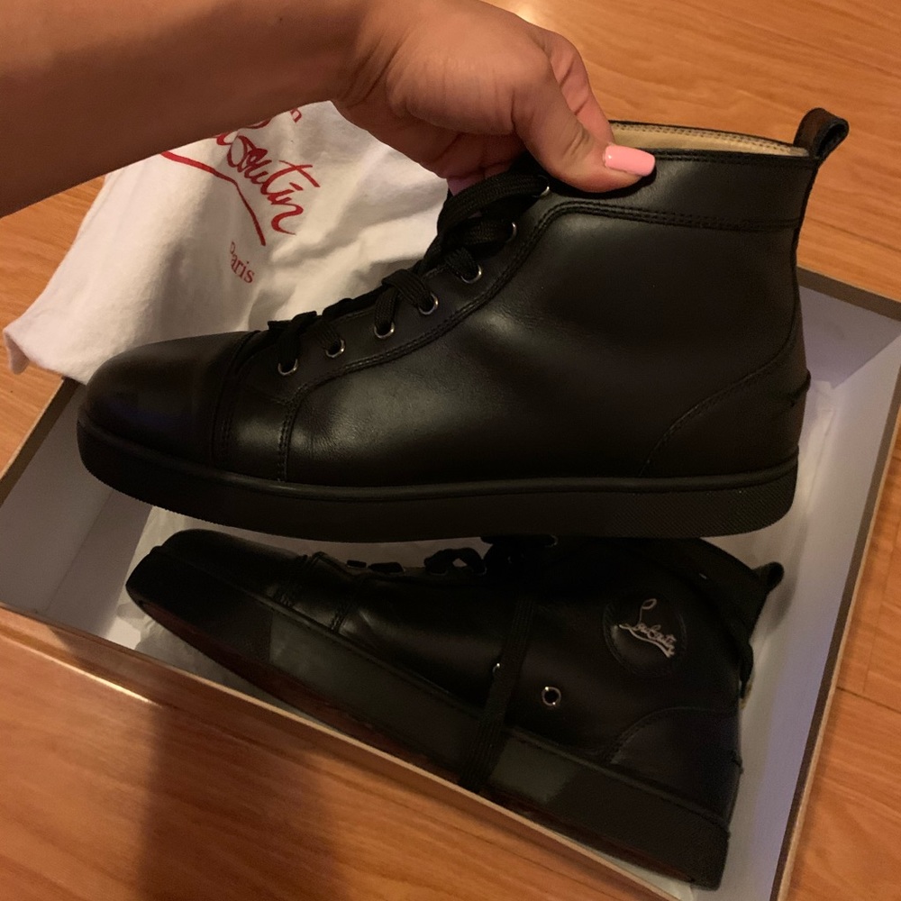 Worn men’s Louboutin sneakers
